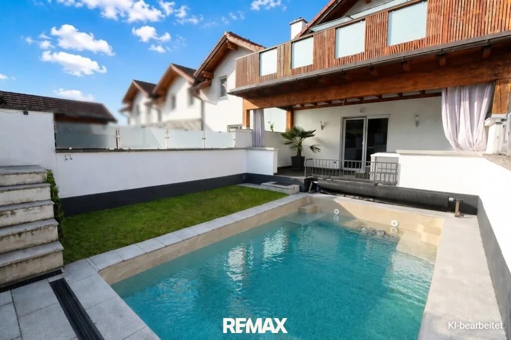 Haus kaufen in Wels-Land – 126 m², € 446.000 – Bild 1 von 17